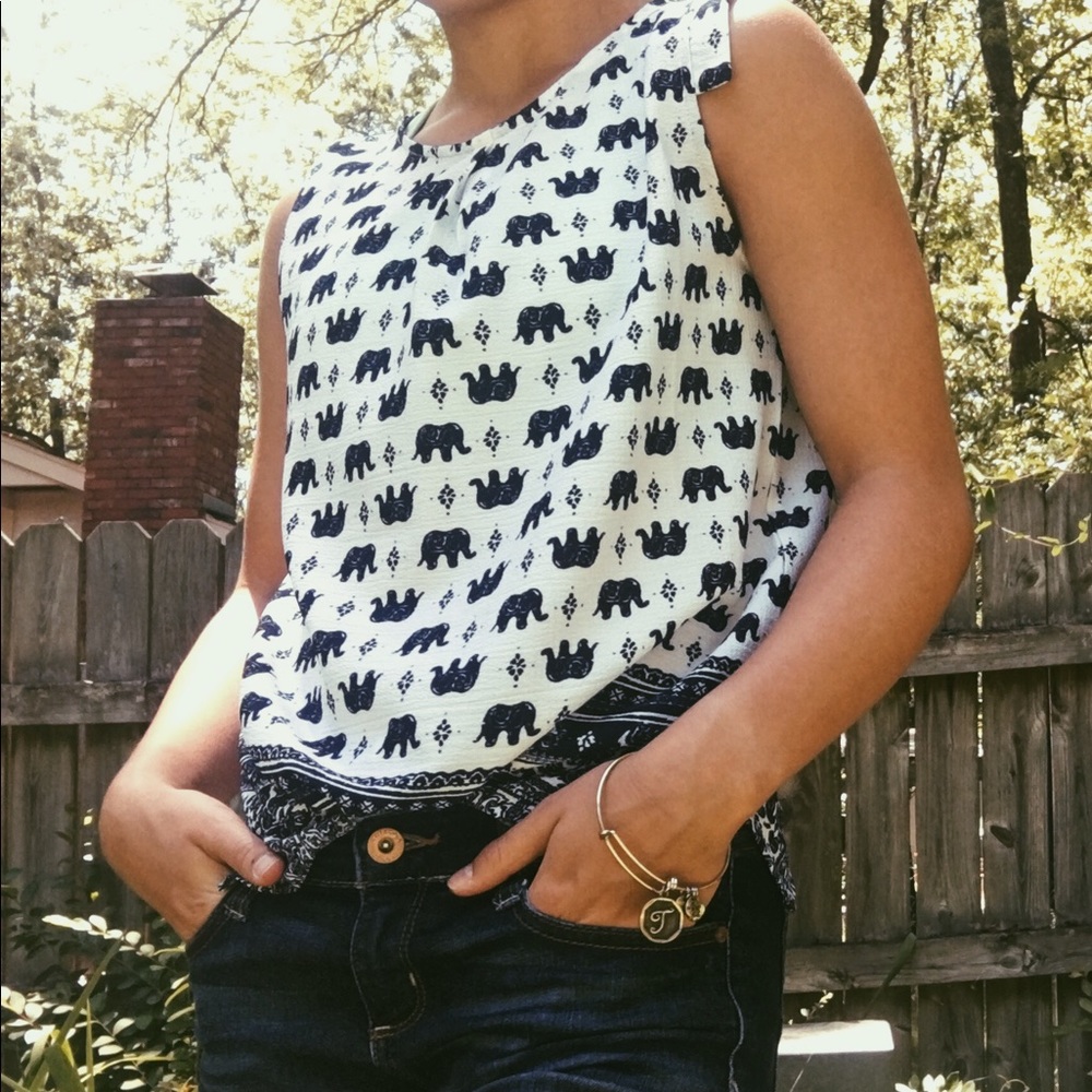 White blouse with elephant pattern